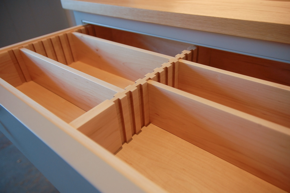 Adjustable kitchen dresser drawers perfect for staying organised. Made from Solid Maple and fitted on soft close runners.