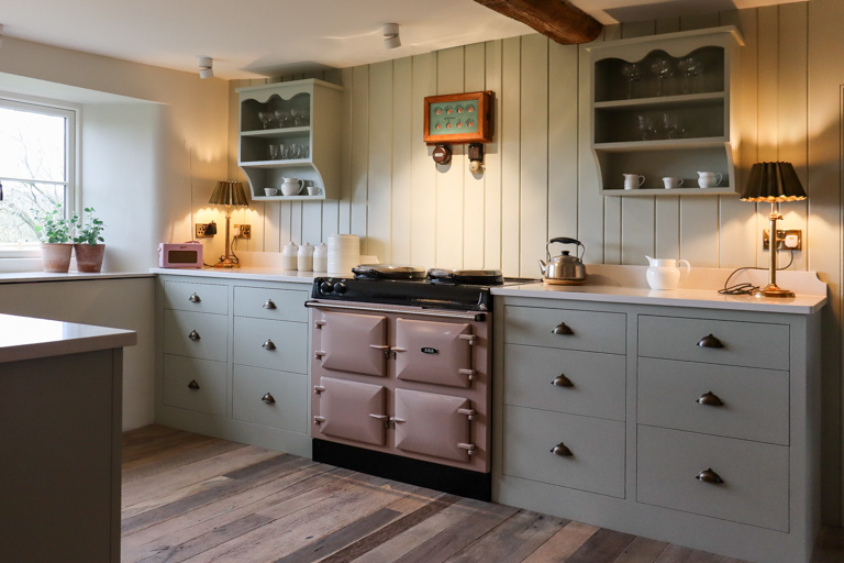 A hand painted cottage kitchen with carefully chosen and organised accents.